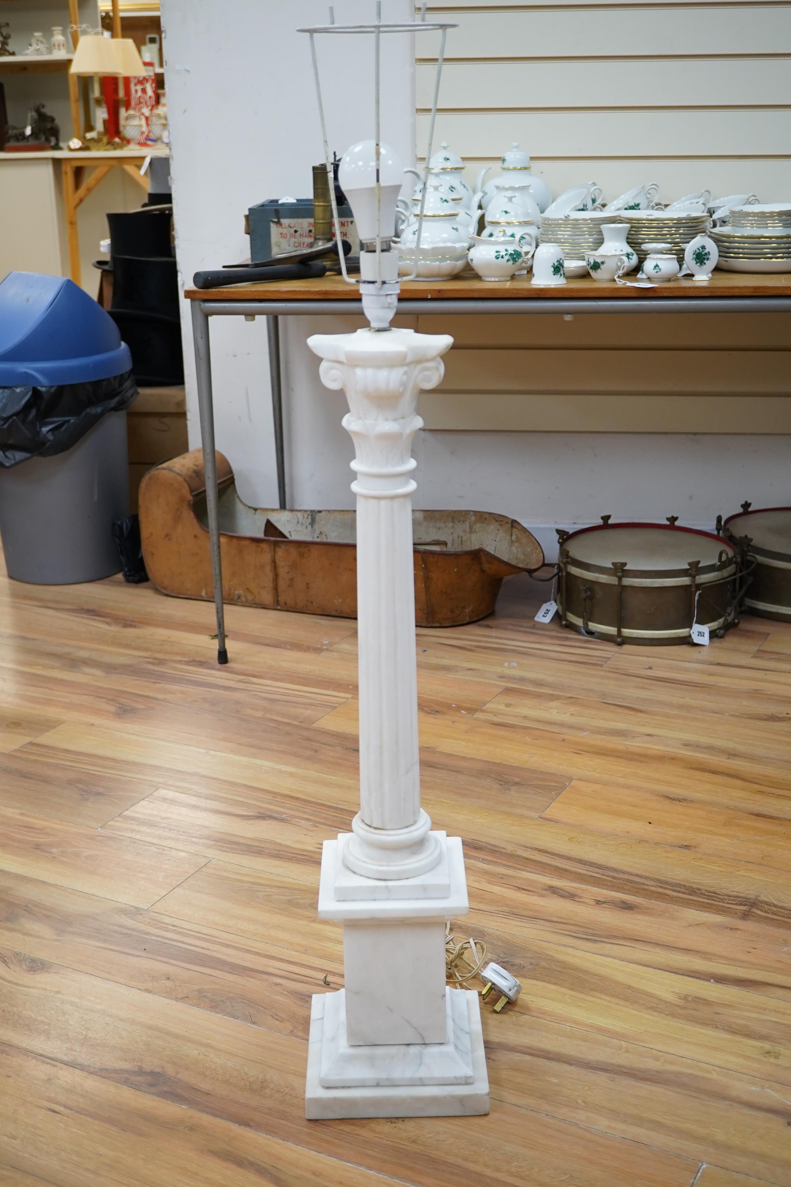 A large white marble Corinthian column table lamp, 80cm high. Condition - small section broken and the reglued to stem